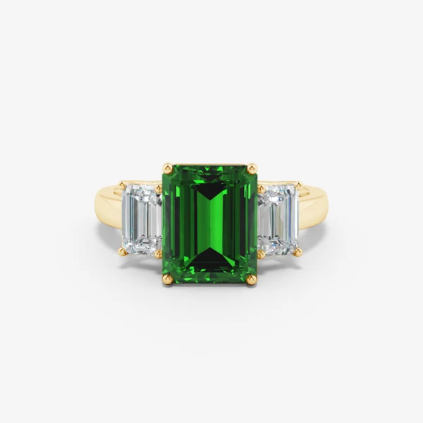 Front view of real emerald-cut three-stone ring